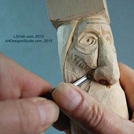 using a round gouge in wood carving