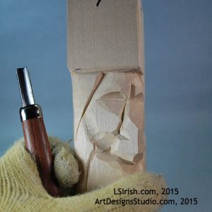 Carving eye lids in the Wood Spirit