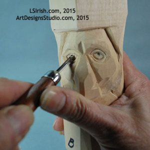 wood carving the pupil of the eye